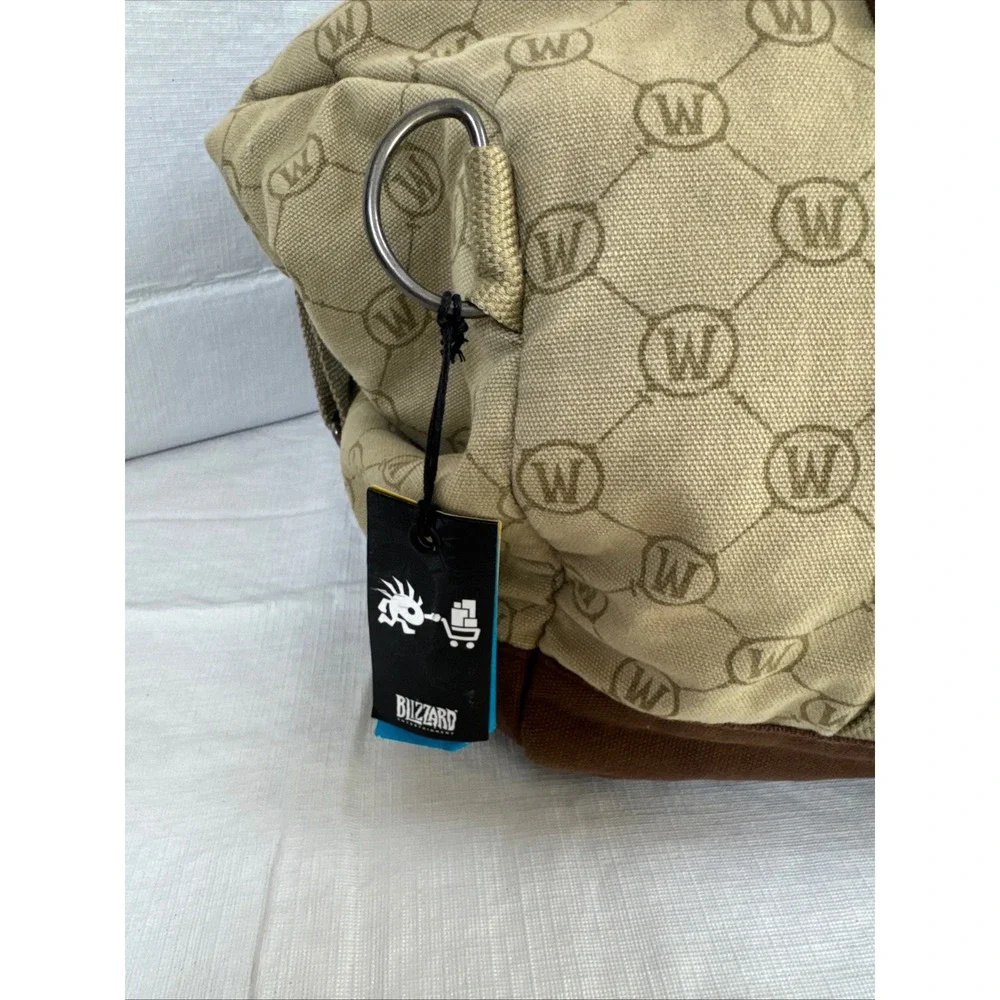 World of Warcraft Blizzard Entertainment Duffle Bag B63131 Tan Brown Logo